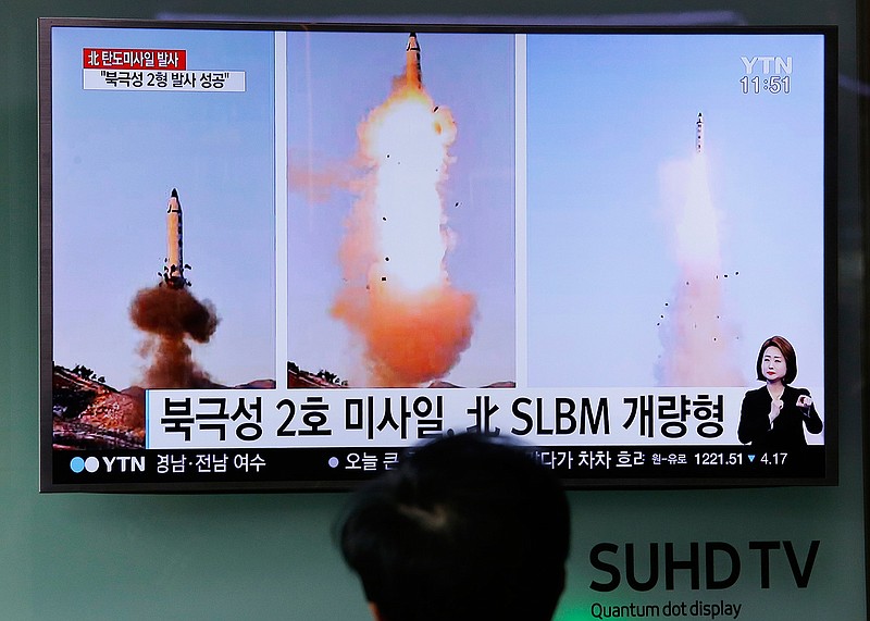 In this Feb. 13, 2017 file photo, a man watches a TV news program showing photos published in North Korea's Rodong Sinmun newspaper of North Korea's "Pukguksong-2" missile launch at Seoul Railway station in Seoul, South Korea. Years of failed efforts to stem North Korea's nuclear and missile programs have followed a usual pattern. The United States seeks tougher action from China, the North's traditional ally. Beijing urges U.S. diplomatic engagement. 