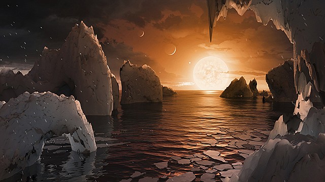 This image provided by NASA/JPL-Caltech shows an artist's conception of what the surface of the exoplanet TRAPPIST-1f may look like, based on available data about its diameter, mass and distances from the host star. The planets circle tightly around a dim dwarf star called Trappist-1, barely the size of Jupiter.