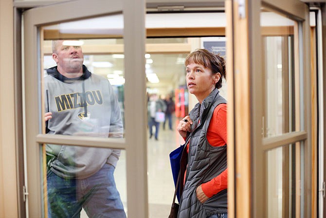 Shelly and Jason Medsworth look at windows at the Weather Shield Windows and Doors at the Home Builder's Association's annual Home Show on Friday at the Capital Mall. The event continues today.