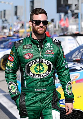 Corey LaJoie walks on pit road before qualifying last Sunday for the Daytona 500 at Daytona International Speedway in Daytona Beach, Fla.