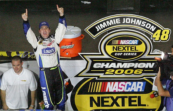 Jimmie Johnson celebrates after winning the 2006 Nextel Cup series season title at Homestead-Miami Speedway in Homestead, Fla.