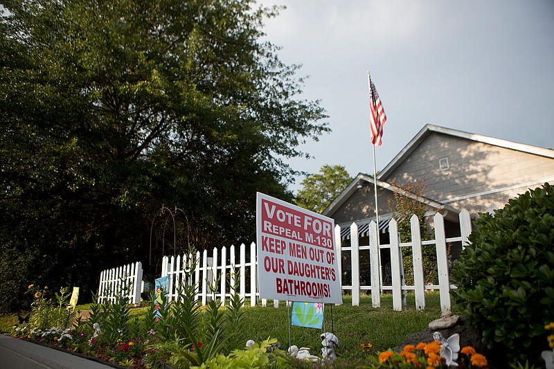 Yard signs like this one on County Avenue in Texarkana, Ark., were put out last year by proponents of Repeal M-130. The ordinance did not pass in special election last June.