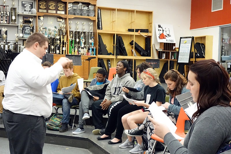 Conductor Jarrod Hendricks, left, leads the Jefferson City High School Tonal Choir in rehearsal Wednesday, Feb. 22, 2017, as the choir prepares for the ICHSA Midwest semifinal competition.