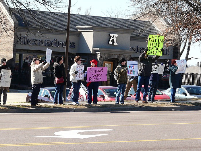 For two hours Saturday morning, Feb. 25, 2017, more than 30 people bundled up against the wind and stood along Missouri Boulevard near U.S. Rep. Blaine Luetkemeyer's office, protesting his "failure" to hold a town hall meeting in the previous week.