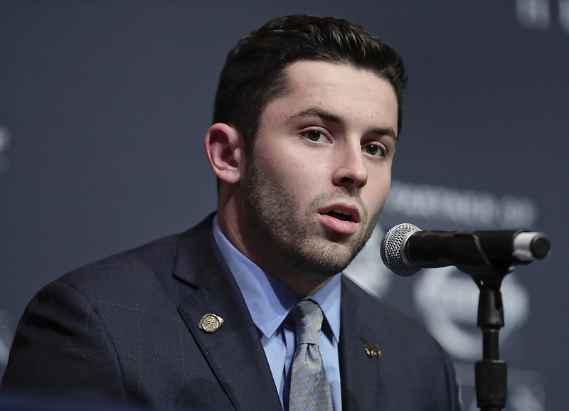 This Dec. 10, 2016, file photo shows Oklahoma's Baker Mayfield answering questions during a news conference before attending the Heisman Trophy award ceremony in New York. Mayfield has been arrested and charged with public intoxication, disorderly conduct and resisting arrest in Fayetteville, Ark., Saturday, Feb. 25, 2017. 