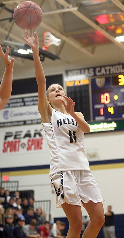 Lauren Alexander shoots during a scrimmage game at Helias Catholic High School in Jefferson City on Friday, November 18, 2016. 