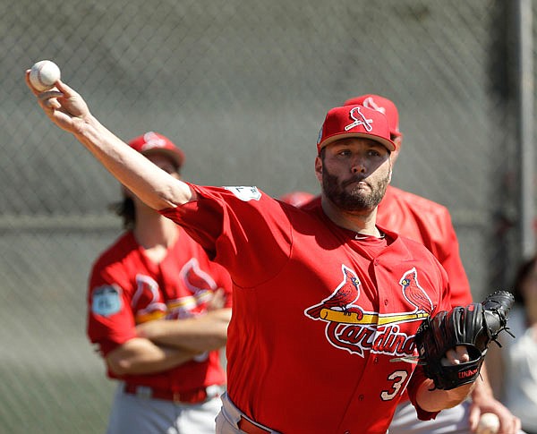 In this Feb. 17 file photo, Cardinals starting pitcher Lance Lynn throws during a spring training workout in Jupiter, Fla. Lynn took the mound Monday for the Cardinals for the first time since undergoing Tommy John surgery in 2015.