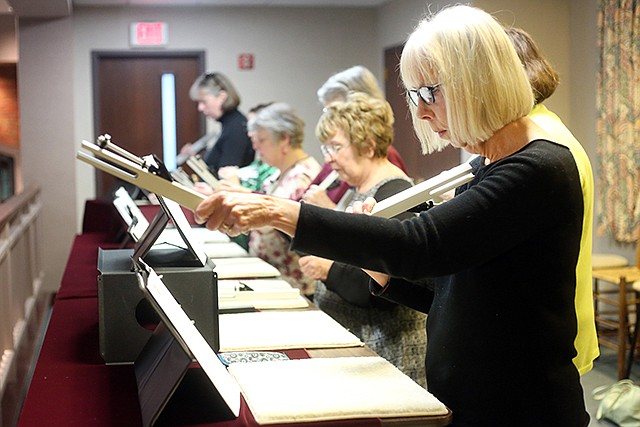 Shelley Swoyer plays the choir chimes during the Lenten Communion Service at the First Presbyterian Church.