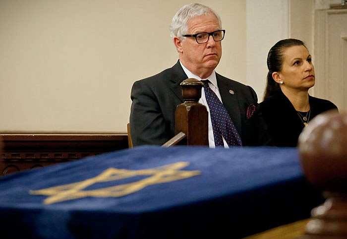 Jonathan Miller, left, NYPD deputy commissioner, and Karen Friedman Agnifilo, chief assistant district attorney, listens during a press conference addressing bomb treats against Jewish organizations and vandalism at Jewish cemeteries.