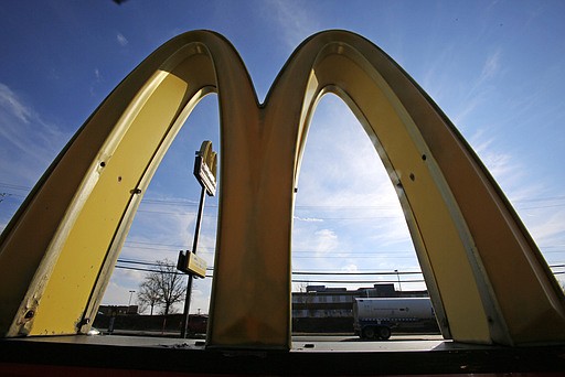 This Wednesday, Feb. 22, 2017, photo, shows the golden arches at sunset at a McDonald's restaurant in Robinson Township, Pa. 