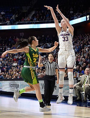 Connecticut's Katie Lou Samuelson makes a 3-pointer during the first half of Monday night's game against South Florida in Uncasville, Conn.