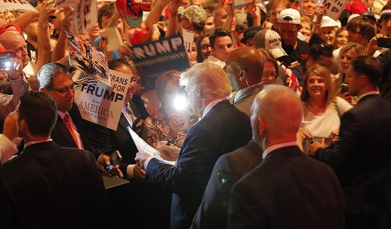Donald Trump shakes hands with supporters after he speaks at a rally at Gilley's Dallas on Thursday, June 16, 2016. 