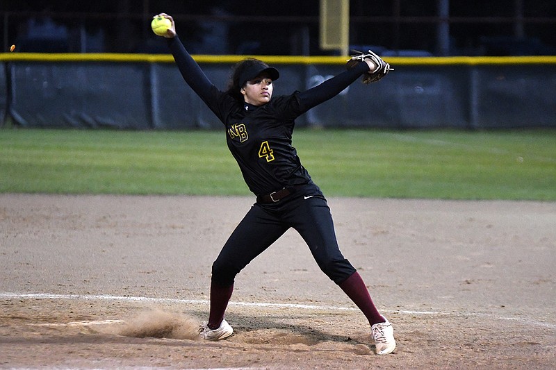 New Boston's Alexis Morden pitches against Prairiland on Saturday during championship game of the 17th annual New Boston/McDonald's softball tournament at Tapp Park. The game was called off because of heavy rain.