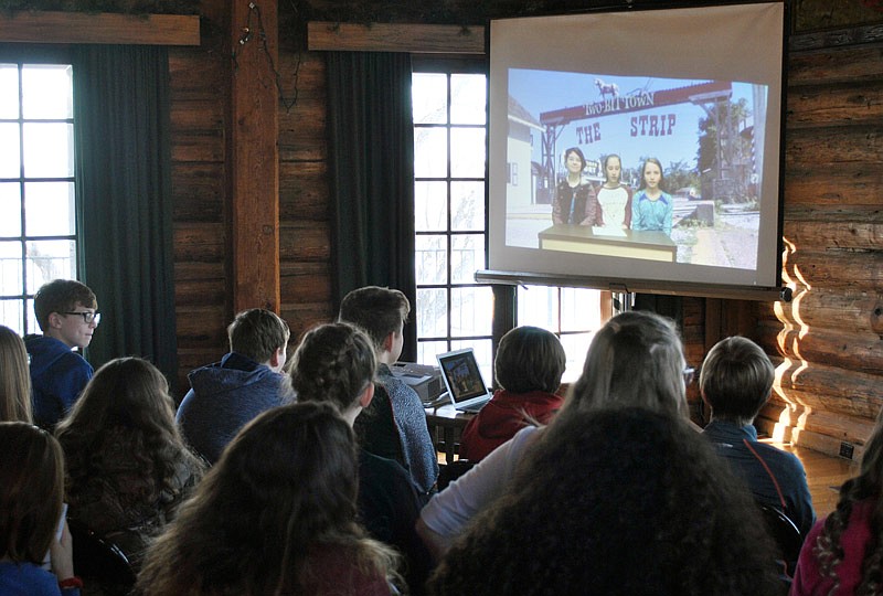 Osage Middle School students watch their fellow sixth-graders discuss renovating Two-Bit Town on Bagnell Dam Strip during their part of video presentations made to members of the Lake Ozark Betterment Committee and city officials Thursday, March 9, 2017 at Willmore Lodge in Lake Ozark, Mo. 