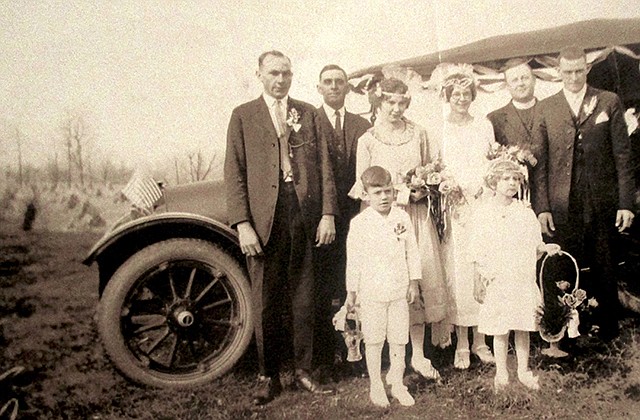 This 1924 spring wedding of Ann Benedict to Pete Swehla is taken in the Missouri River bottom, with corn shocks from the fall in the background. The bridesmaid is Edith Benedict and the best man is Joe Schollmeyer. Fred Sundermeyer is between them. The flower girl is Josephine Benedict and the boy is Frank Benedict.