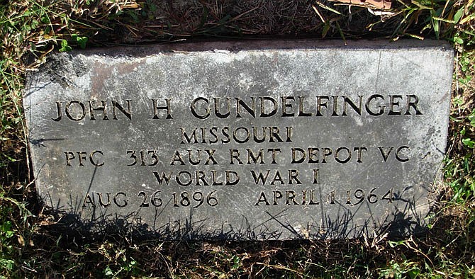 Darkened by the passage of decades, the grave marker of John H. Gundelfinger is all that remains of the legacy of one of Jefferson City's World War I veterans. The veteran served with the Veterinary Corps during the war and later became involved in the local real estate industry. 