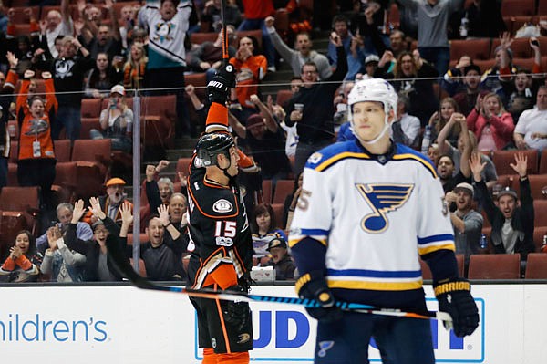 The Ducks' Ryan Getzlaf celebrates his goal as Colton Parayko of the Blues stands near the net during the second period of Wednesday night's game in Anaheim, Calif.