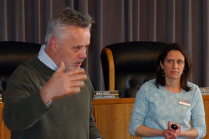 Ed Siegmund, left, director of the Mid-Mo Regional Planning Commission, talks at Thursday's meeting with Mary Culler, environmental specialist with the state Department of Natural Resources looking on.