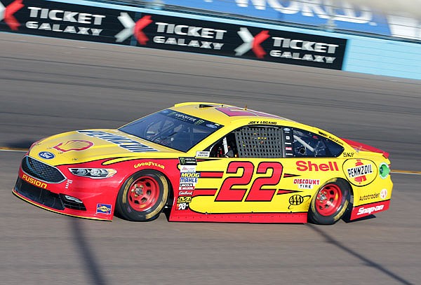 Joey Logano drives during Friday's qualifying session for the NASCAR Cup Series race at Phoenix International Raceway in Avondale, Ariz. Logano will start on the pole for Sunday's race.