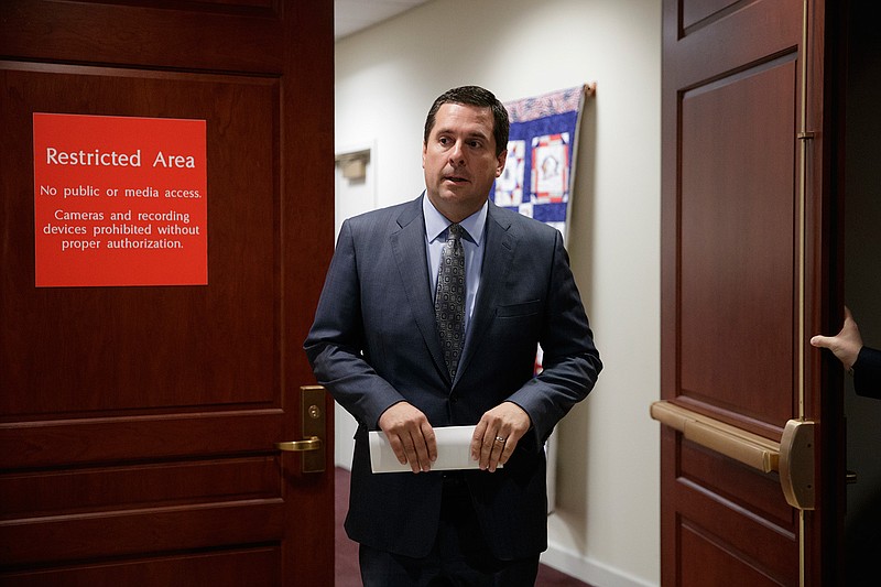 In this Tuesday, March 7, 2017, file photo, House Intelligence Committee Chairman Devin Nunes leaves a secure area in the Capitol in Washington to tell reporters he will hold an open hearing on March 20 to investigate alleged Russian interference in the 2016 election. Nunes and House Intelligence Committee Ranking Member Adam Schiff, D-Calif., were among a number of lawmakers who said on news shows on Sunday, March 19, they had seen no evidence that the Obama administration ordered wiretaps on Donald Trump during the campaign. 