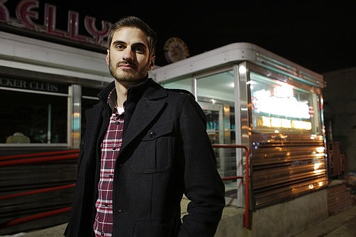 In this Wednesday, Feb. 22, 2017 photo, Matt Garlock, of Mansfield, Mass., stands for a photo in Somerville, Mass. The 29-year old has trouble making out what his friends say in loud bars, but when he got a hearing test, the result was normal. Scientists have been finding evidence that loud noise, from rock concerts, leaf blowers, power tools and the like, damages our hearing in a previously unsuspected way. It may not be immediately noticeable, and it does not show up in standard hearing tests. 