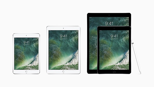 This photo provided by Apple shows the family of iPads, from left, the iPad mini 4, the new iPad, the 9.7-inch iPad Pro and the 12.9-inch one, along with the Apple Pencil. On Tuesday, Apple cut prices on two iPad models and introduced red iPhones, but the company held back on updating its higher-end iPad Pro tablets.