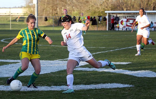 Kenzie Gourley of Jefferson City closes in on the ball during a game against Rock Bridge last season at the 179 Soccer Park.