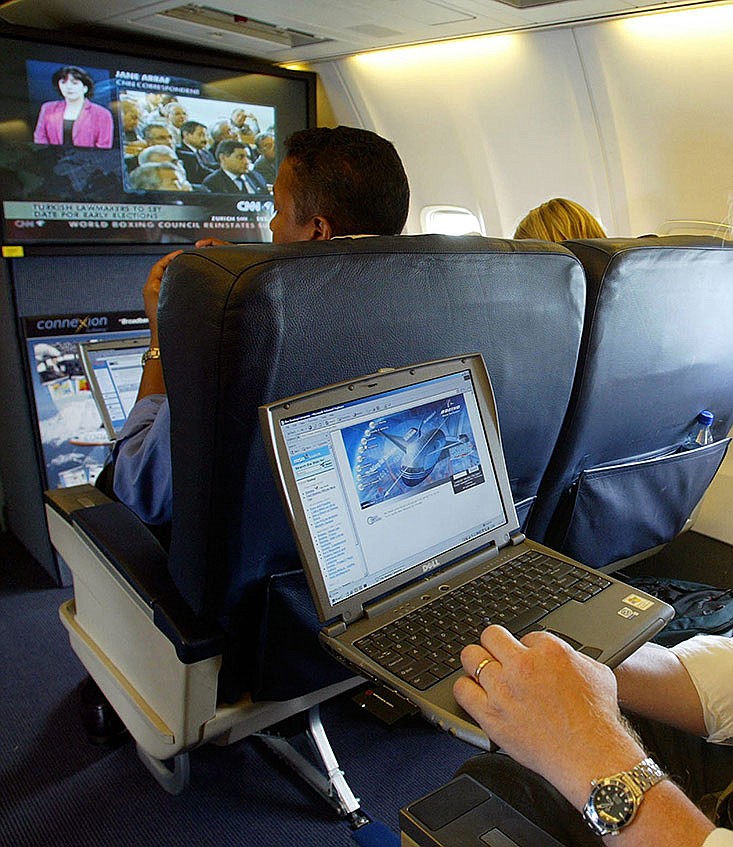 A laptop computer is used on a plane in this file photo.