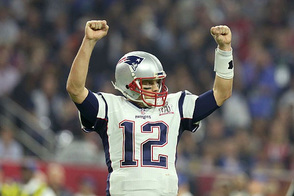 In this Feb. 5 file photo, Patriots quarterback Tom Brady celebrates a touchdown against the Atlanta Falcons during Super Bowl LI in Houston. Tom Brady's missing jersey from the Super Bowl has been found in the possession of a member of the international media.