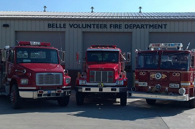 In this photo from the Belle Fire Department's website, fire trucks sit outside the fire station bays in Belle, Mo.