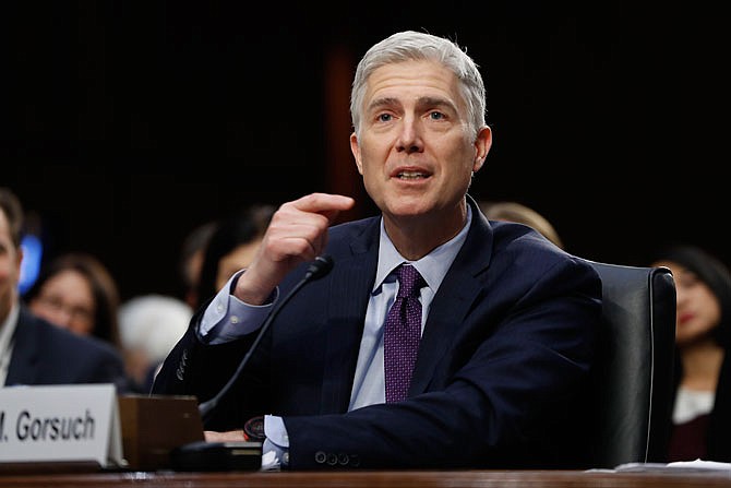 Supreme Court Justice nominee Neil Gorsuch testifies Tuesday on Capitol Hill in Washington at his confirmation hearing before the Senate Judiciary Committee.
