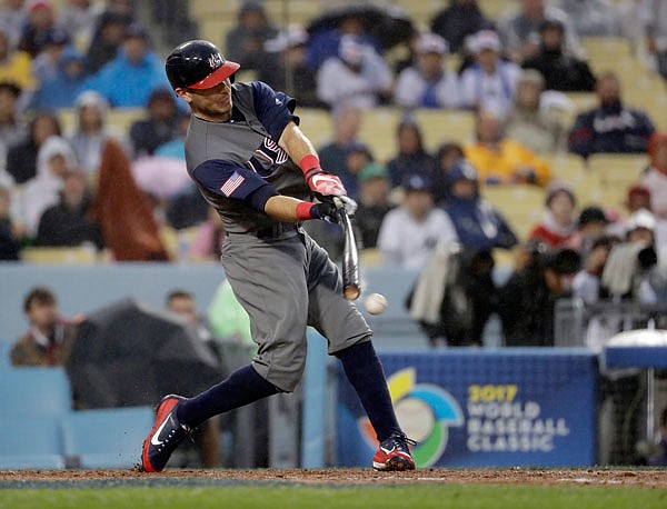 United States second baseman Ian Kinsler hits during the third inning of Tuesday's semifinal in the World Baseball Classic against Japan in Los Angeles.