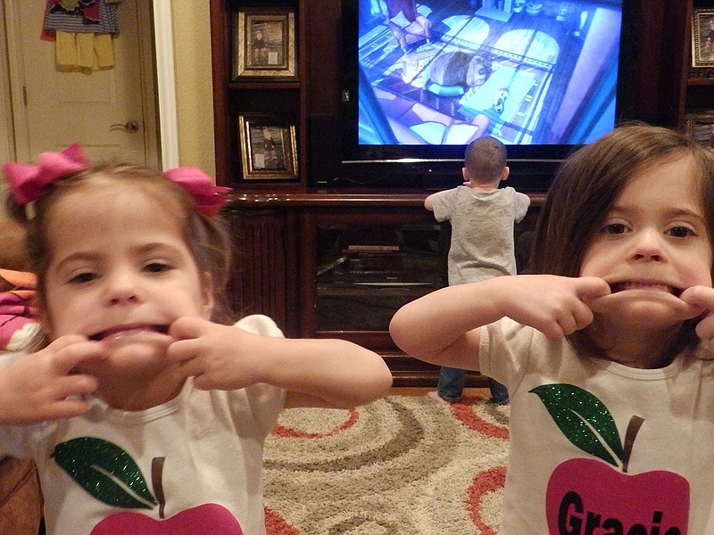 Rayleigh and Gracie Seals, two of the Seals quintuplets, have learned to make faces. "That's the way they greet everybody now," Michelle Seals said. "It's their new move," Steven added.
