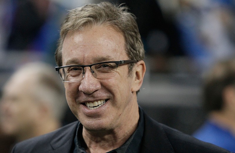 In this Nov. 27, 2014, file photo, comedian Tim Allen is seen on the sidelines before the first half of an NFL football game between the Detroit Lions and the Chicago Bears in Detroit. The Anne Frank Center for Mutual Respect is calling on Tim Allen to apologize for comparing the experience of being a conservative in Hollywood to living in Germany in the 1930s during an appearance on ABC's "Jimmy Kimmel Live" on Friday, March 17, 2017.