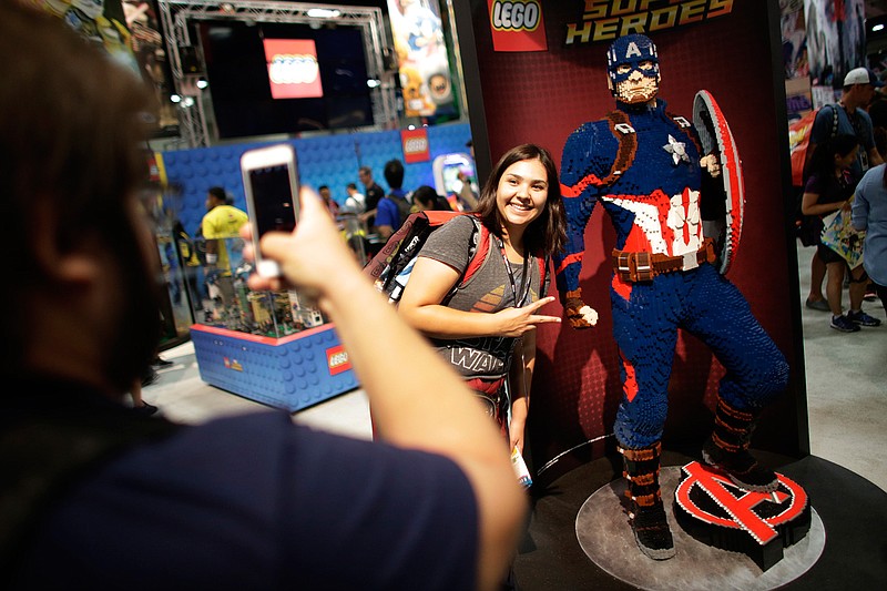 Danah Hernandez is photographed by Gonzalo Glicia next to a Lego sculpture of Captain America at the Comic Con International in San Diego in July 2016. San Diego Comic-Con International will open a museum of popular culture in nearby Balboa Park.