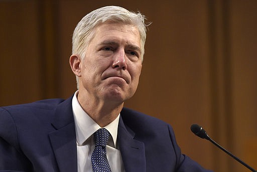 Supreme Court Justice nominee Neil Gorsuch listens as he is asked a question by Sen. Mazie Hirono, D-Hawaii, on Capitol Hill in Washington, Wednesday, March 22, 2017, during his confirmation hearing before the Senate Judiciary Committee.