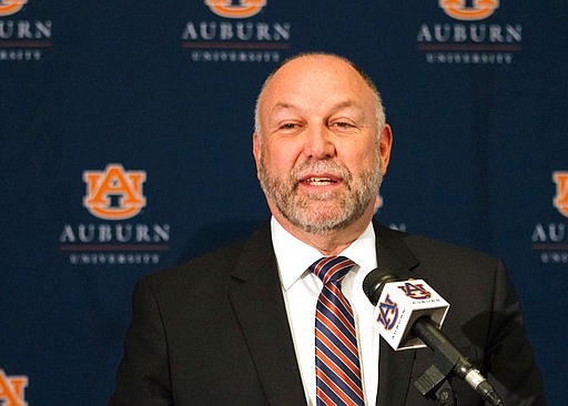 In this Monday, March 20, 2017, photo, Iowa State University President Steven Leath answers questions at a news conference following the announcement of his selection as the next president of Auburn University in Auburn, Ala. Leath will begin his tenure in July. (Jim Little/Opelika-Auburn News via AP)