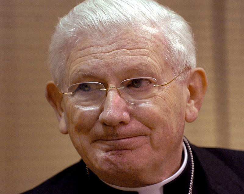 In this Saturday, April 2, 2005, file photo, Baltimore Cardinal William Keeler speaks to reporters before conducting Mass at The Cathedral of Mary Our Queen, in Baltimore. Keeler, who helped ease tensions between Catholics and Jews, has died. 