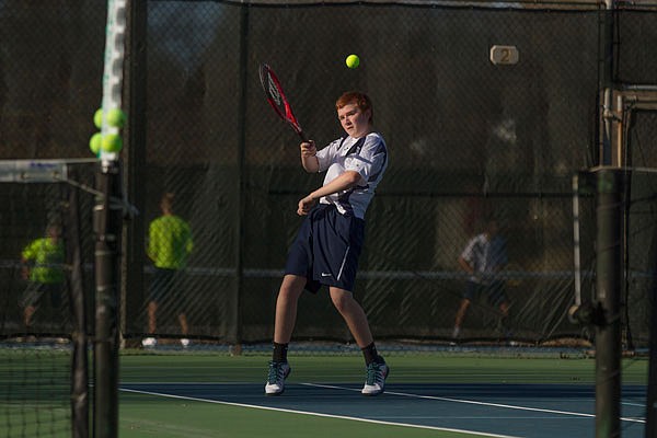 Tristan Grawe of Helias makes a return during a match in his freshman season.