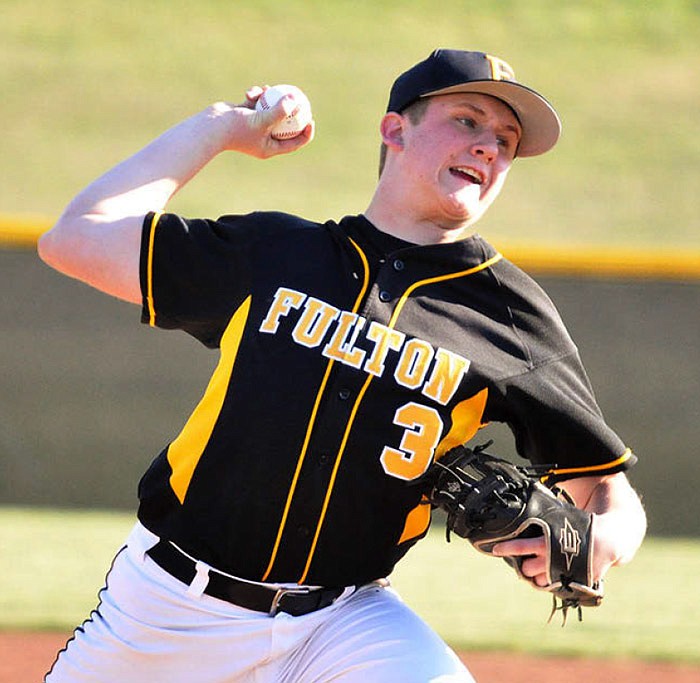 Fulton senior starter Luke Gray prepares to deliver a pitch during the Hornets' North Central Missouri Conference matchup with Marshall on Thursday night at the high school athletic complex. Gray and senior relievers Taylor Nelson and Jared Peery combined on a three-hitter in Fulton's 5-1 victory.