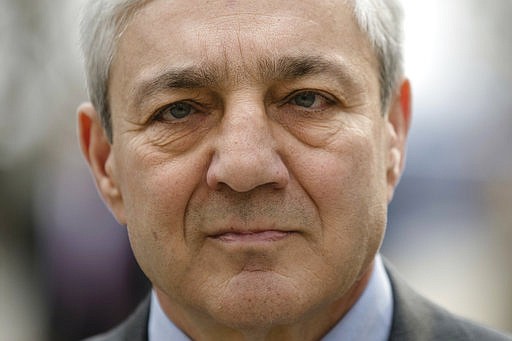 Former Penn State president Graham Spanier walks from the Dauphin County Courthouse in Harrisburg, Pa., Friday, March 24, 2017. Spanier was convicted Friday of hushing up suspected child sex abuse in 2001 by Jerry Sandusky, whose arrest a decade later blew up into a major scandal for the university and led to the firing of beloved football coach Joe Paterno. 