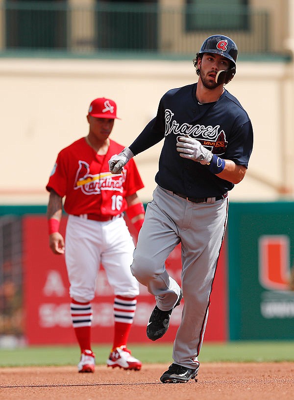 Braves shortstop Dansby Swanson rounds the bases after hitting a home run in the first inning of a spring training game against the Cardinals earlier this month in Jupiter, Fla.