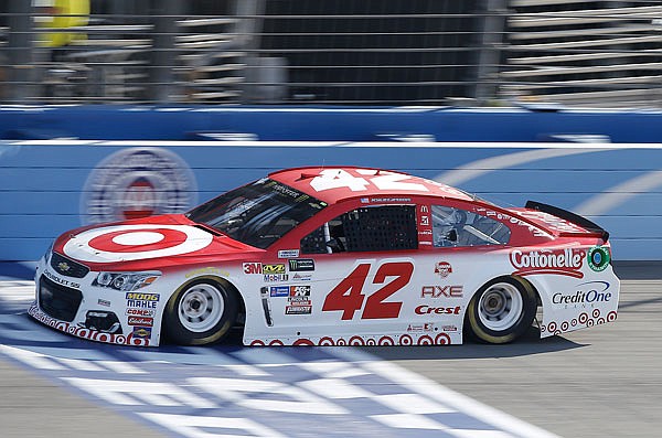 Kyle Larson drives during qualifying Friday for the NASCAR Cup race at Auto Club Speedway in Fontana, Calif. Larson edged Denny Hamlin for the pole.
