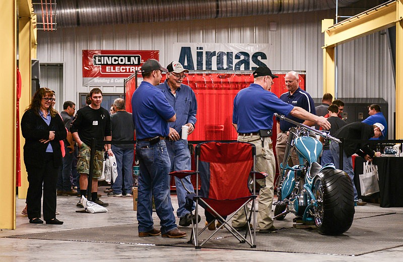 Parents and prospective students tour State Technical College's new welding center Saturday, March 25, 2017 during an open house. Partnered with the Airgas company, the new welding center received a brand new chopper-style motorcycle donated by Airgas and furnished by Orange County Choppers in New York.