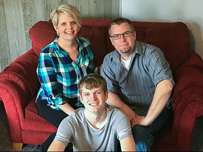 From left, Mandy, Braden and Jason Rosenstengel sit for a family portrait Saturday. Jason is currently on dialysis, waiting for a kidney donation.