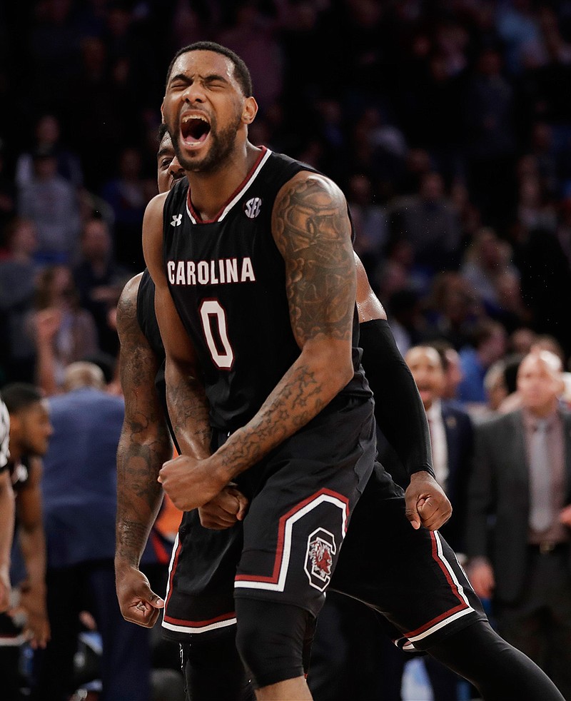 South Carolina guard Sindarius Thornwell (0) reacts after dunking the ball against Florida during the second half of the East Regional championship game of the NCAA men's college basketball tournament, Sunday, March 26, 2017, in New York. South Carolina won 77-70. 