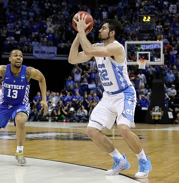 North Carolina forward Luke Maye shoots the winning basket late in the second half of Sunday's South Regional final in the NCAA Tournament in Memphis, Tenn.