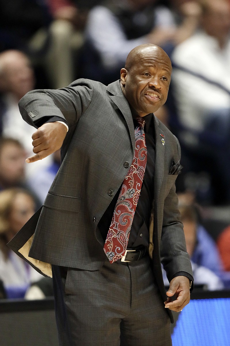 Arkansas head coach Mike Anderson directs his team in the first half against Kentucky on March 12 in Nashville, Tenn. 