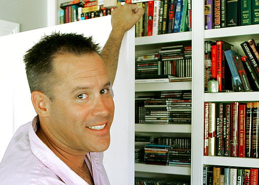 This Sept. 2, 2005 file photo shows best-selling author Vince Flynn in the library of his Edina, Minn. home. He died in 2013 after battling prostate cancer. 