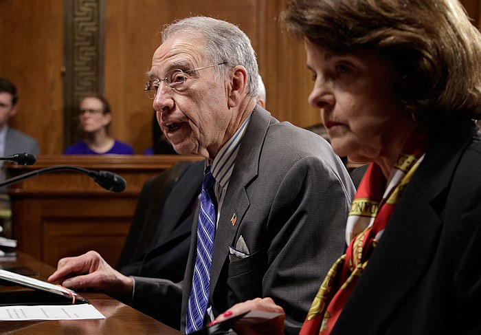 Senate Judiciary Committee Chairman Sen. Charles Grassley, R-Iowa, accompanied by the committee's ranking member Sen. Dianne Feinstein, D-Calif., speaks on Capitol Hill7. Senate Democrats forced a one-week delay in a committee vote on Neil Gorsuch, President Donald Trump's Supreme Court nominee.